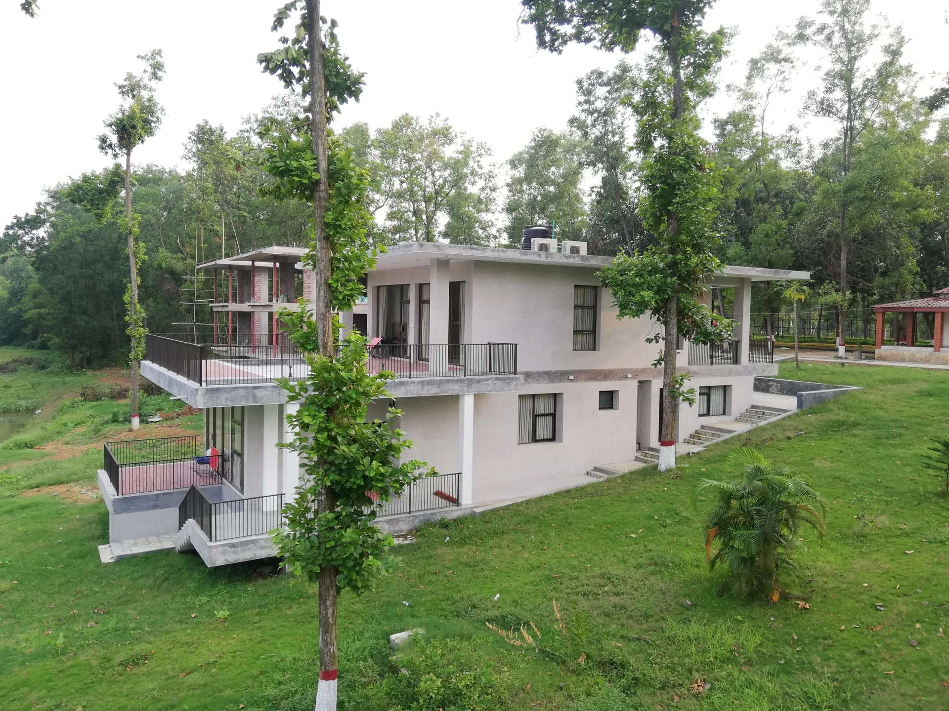 Bilashmoni cottage among trees