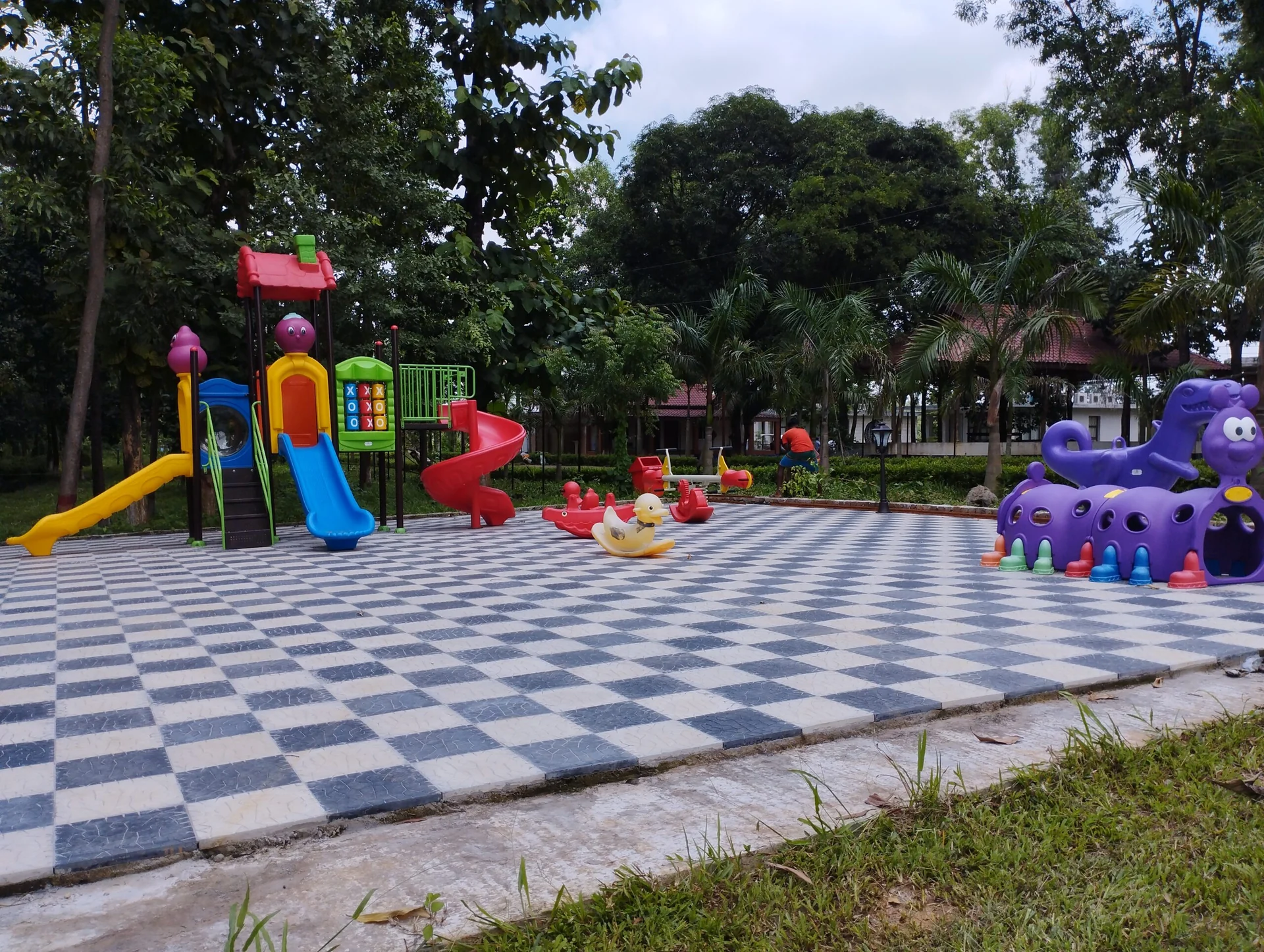 Resort play area surrounded by trees