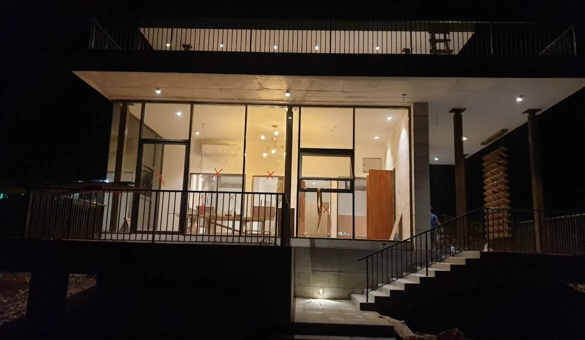 Bilashmoni cottage illuminated after dark